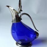 Silver plated metal and glass wine decanter in the shape of a duck, vintage from the 70s