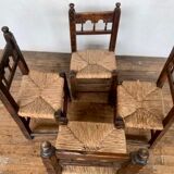 Series of 4 brutalist rustic chairs in carved wood straw seat