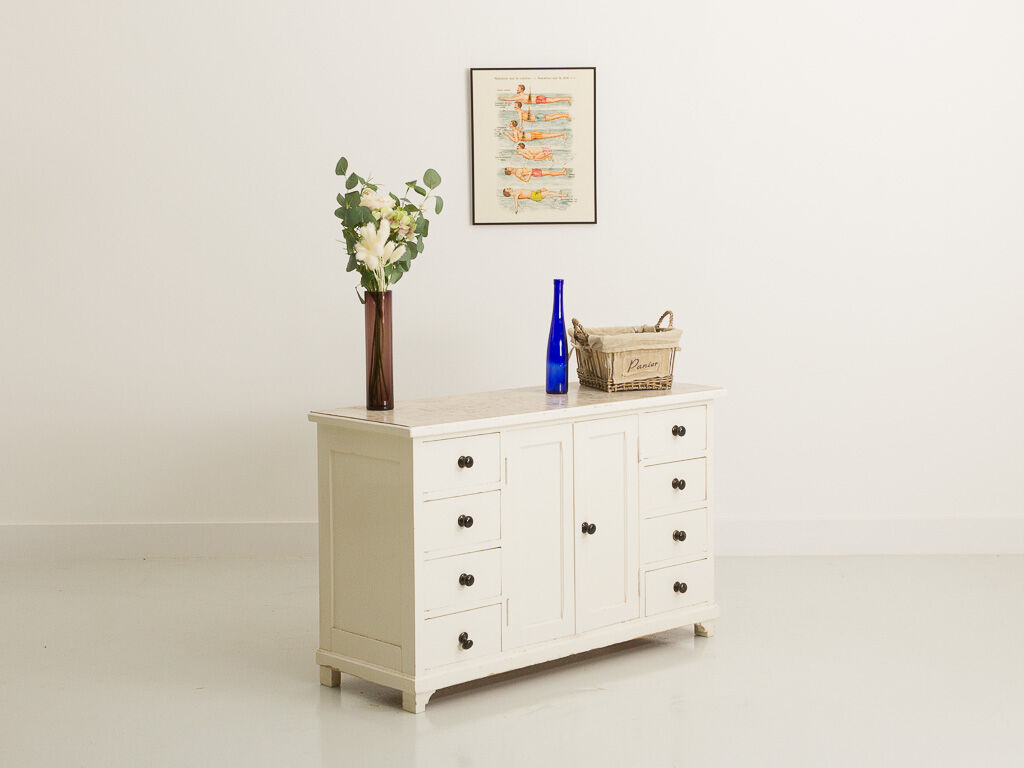 Small accent cabinet with drawers and swing doors
