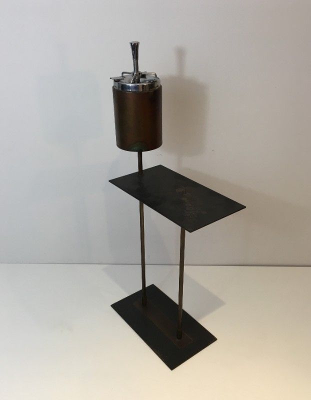 Modernist ashtray in black lacquered metal and brass