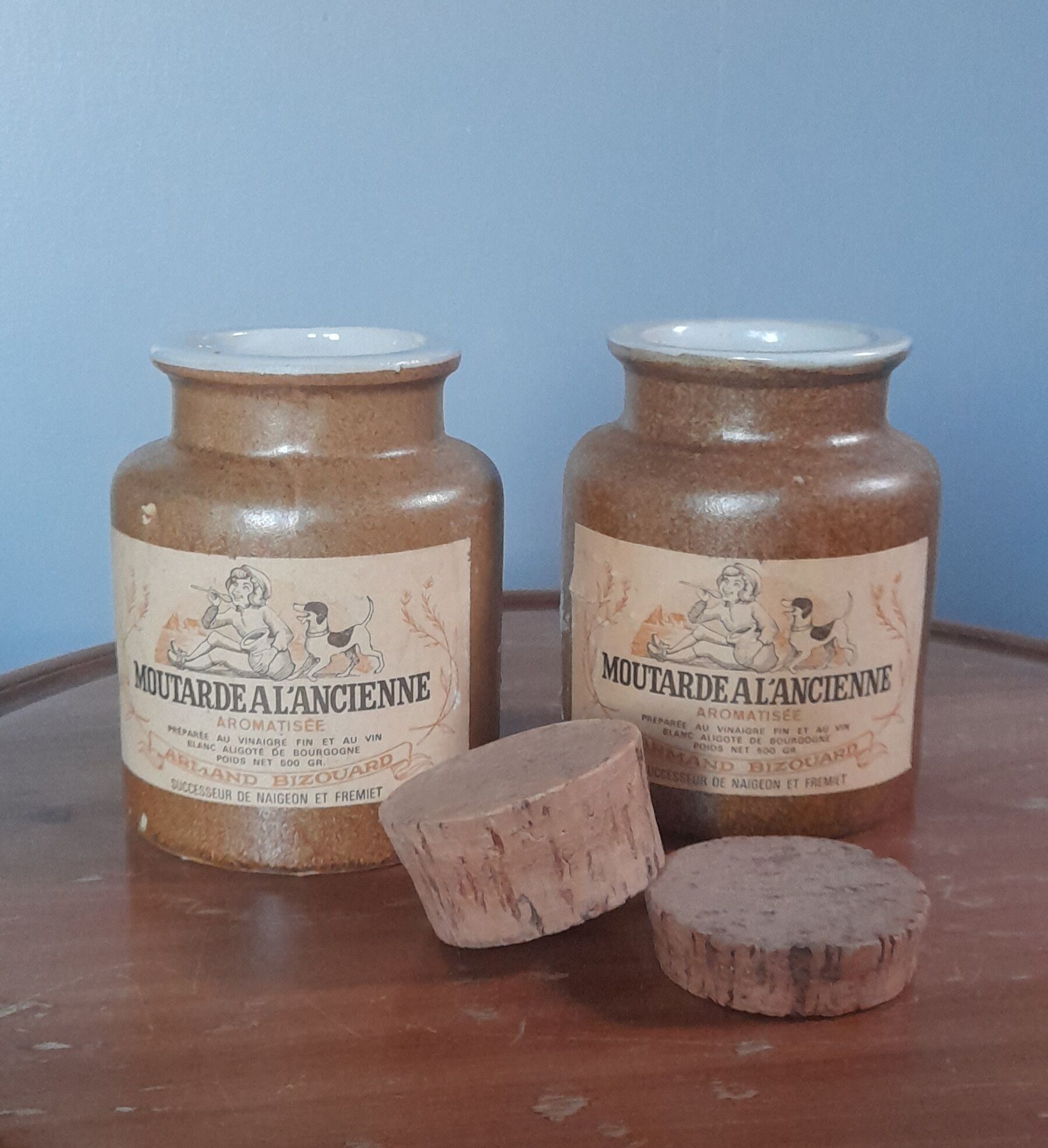 Duo of glazed stoneware mustard pots with label and corks, armand bizouard, amora, 1950