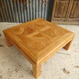 Square coffee table with a drawer in cherry wood.