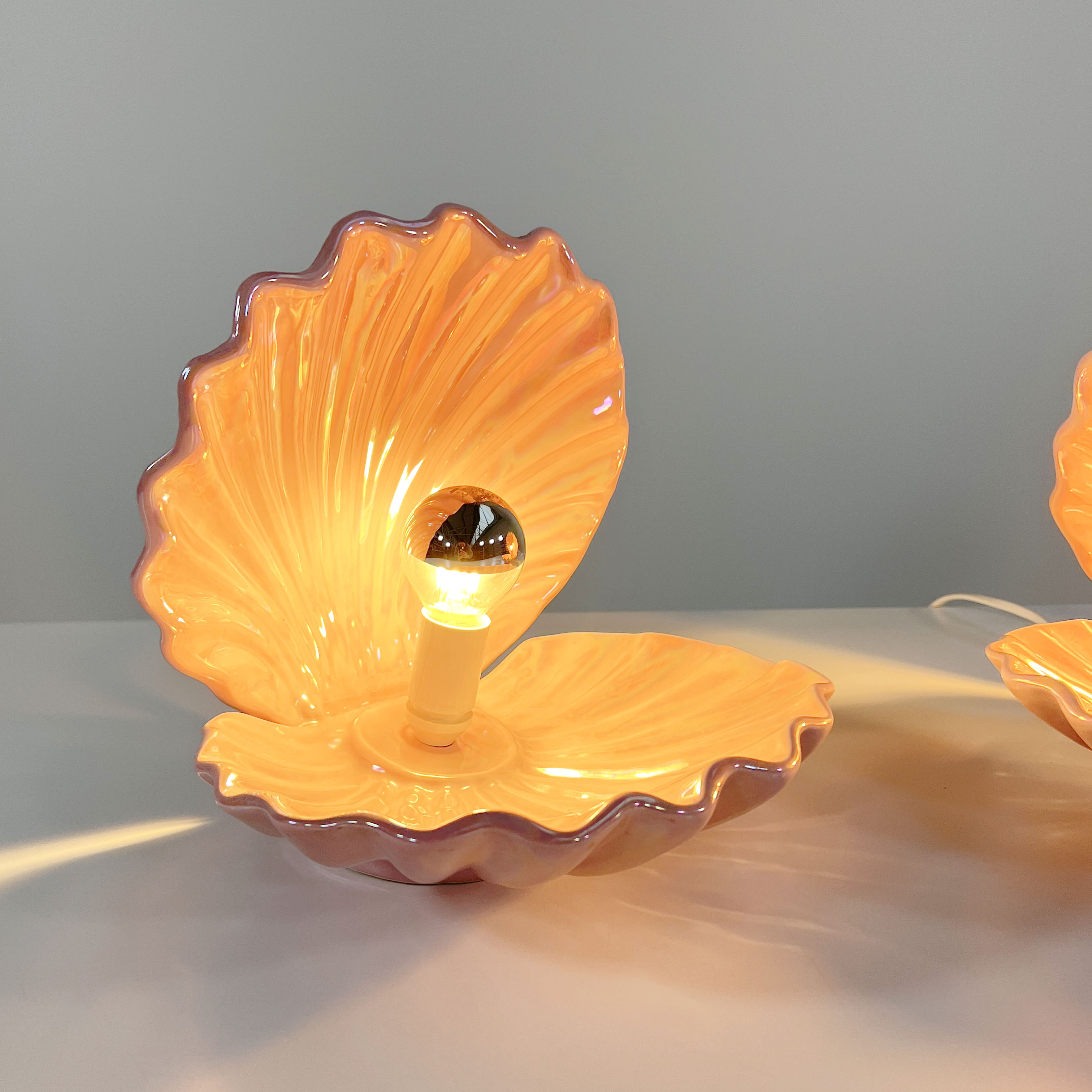 Pair of ceramic shell lamps, 1960