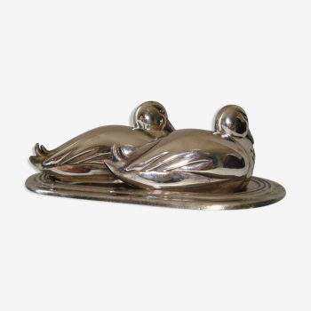 Salt and pepper shaker on silver metal tray in the shape of a duck art deco style