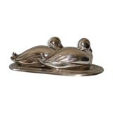Salt and pepper shaker on silver metal tray in the shape of a duck art deco style