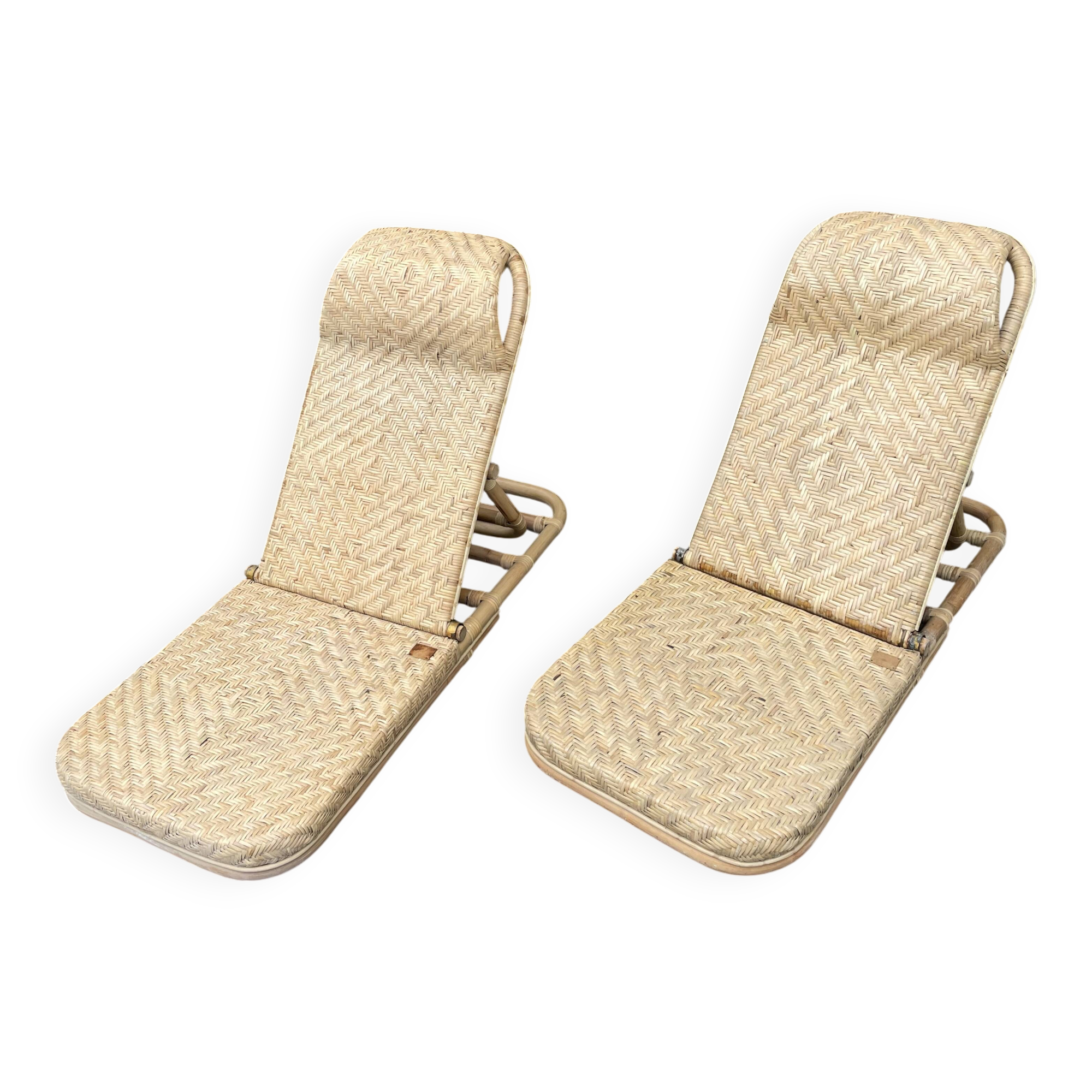 Two rattan garden chairs