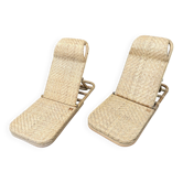 Two rattan garden chairs