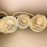 Cascade pendant light with 3 molded glass globes in vintage arabesque amber glass