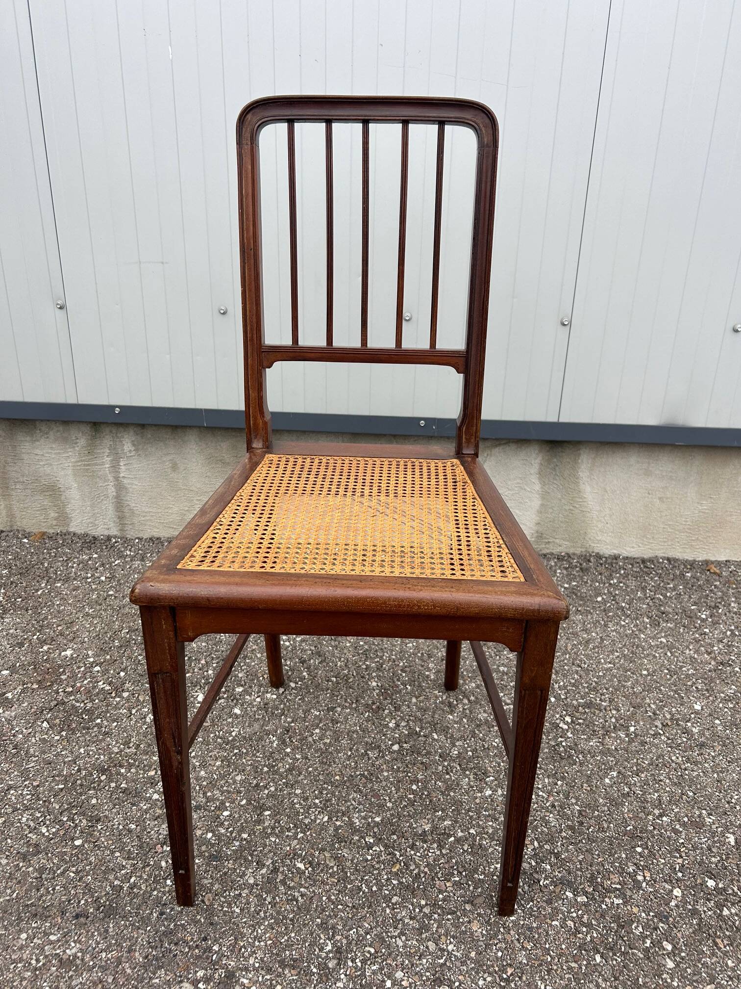 caned chair 1900