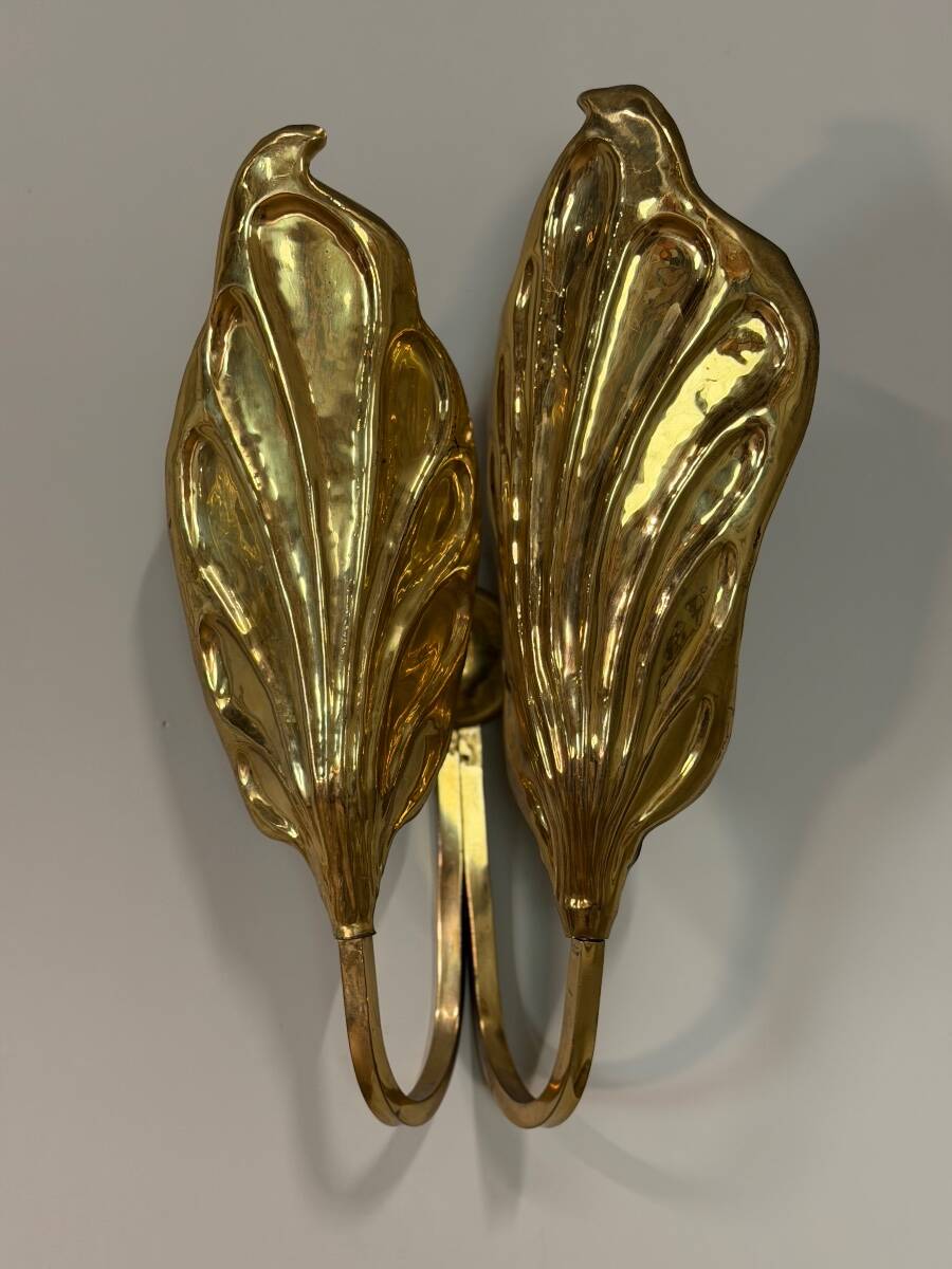 Set of four gilt brass wall lights, Tommaso Barbi, circa 1960.