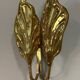 Set of four gilt brass wall lights, Tommaso Barbi, circa 1960.