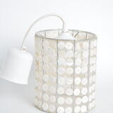 Suspension in mother-of-pearl buttons