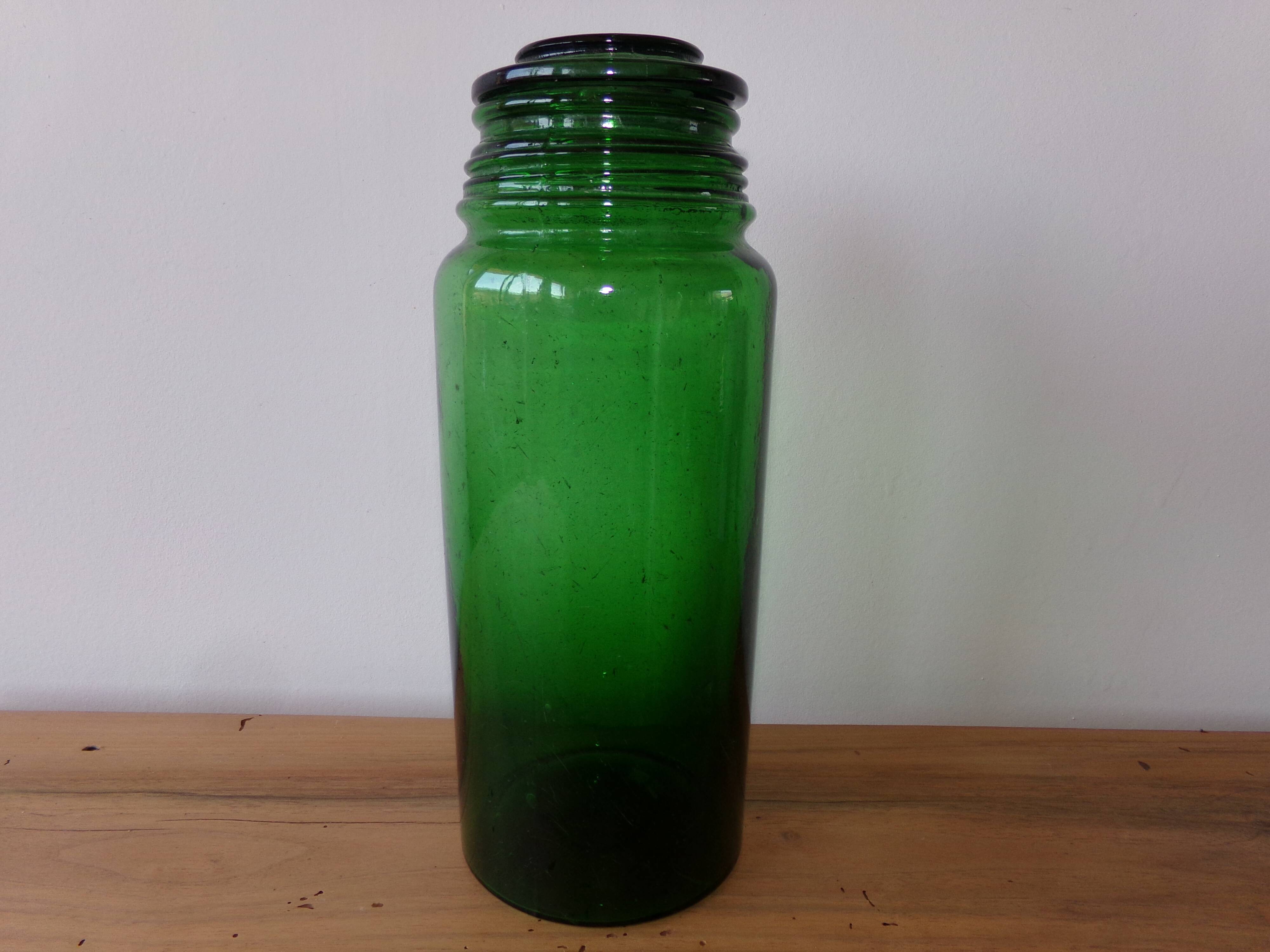 Antique green glass jar