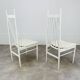 2 Scandinavian slatted chairs, white, from the 1960s.