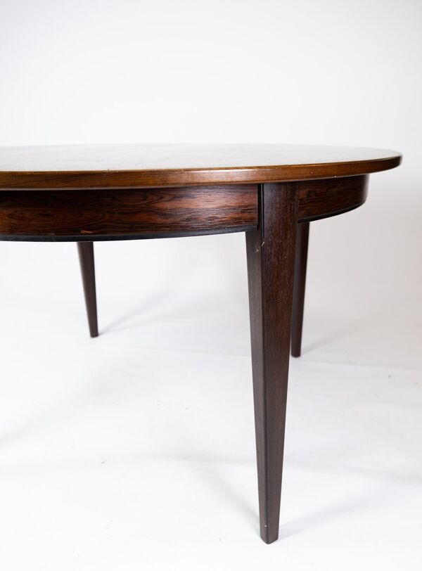 table à manger en bois de rose conçue par Omann Junior à partir des années 1960.