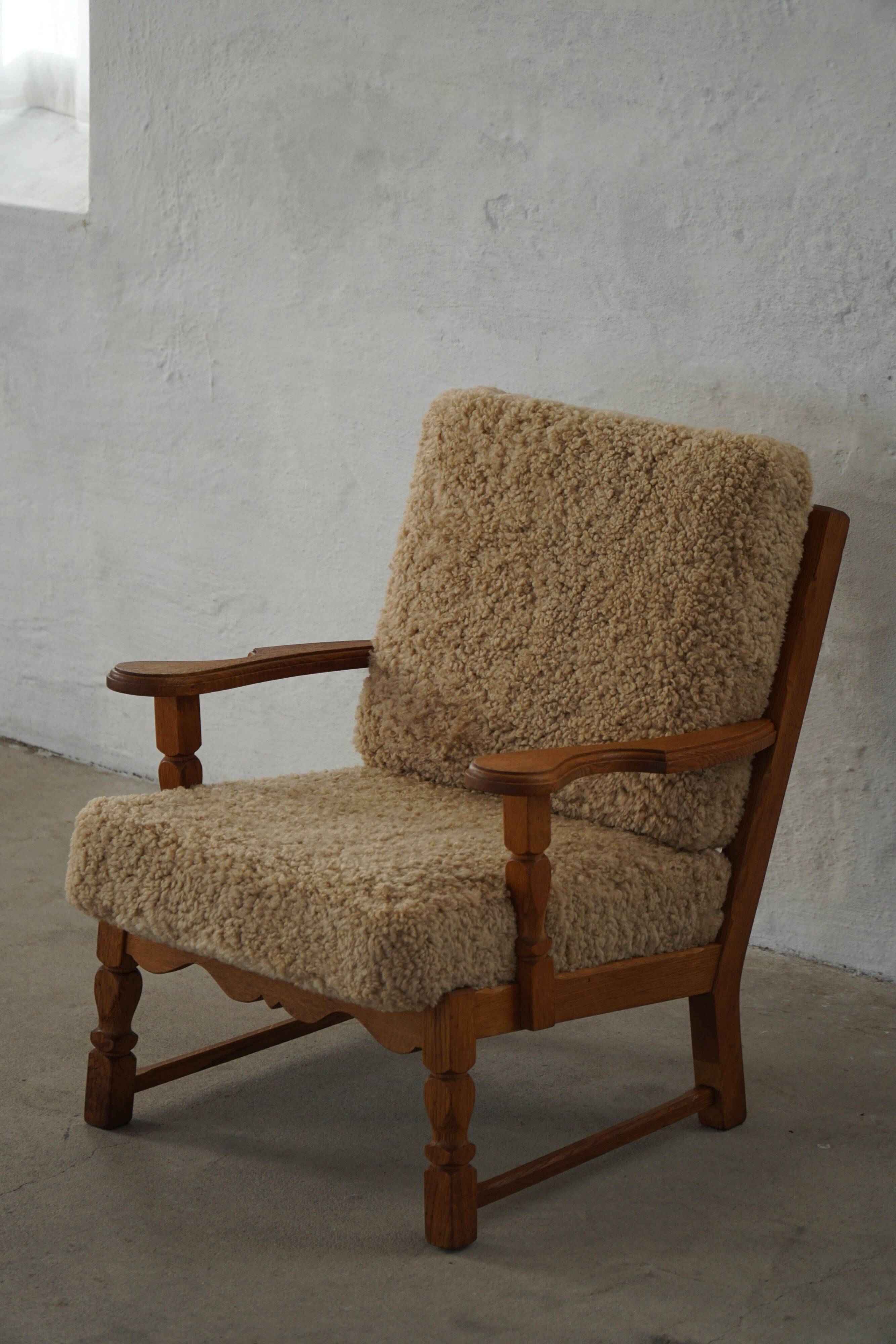 Danish modernist lounge chair in oak and lambswool, Henning Kjærnulf, 1960s