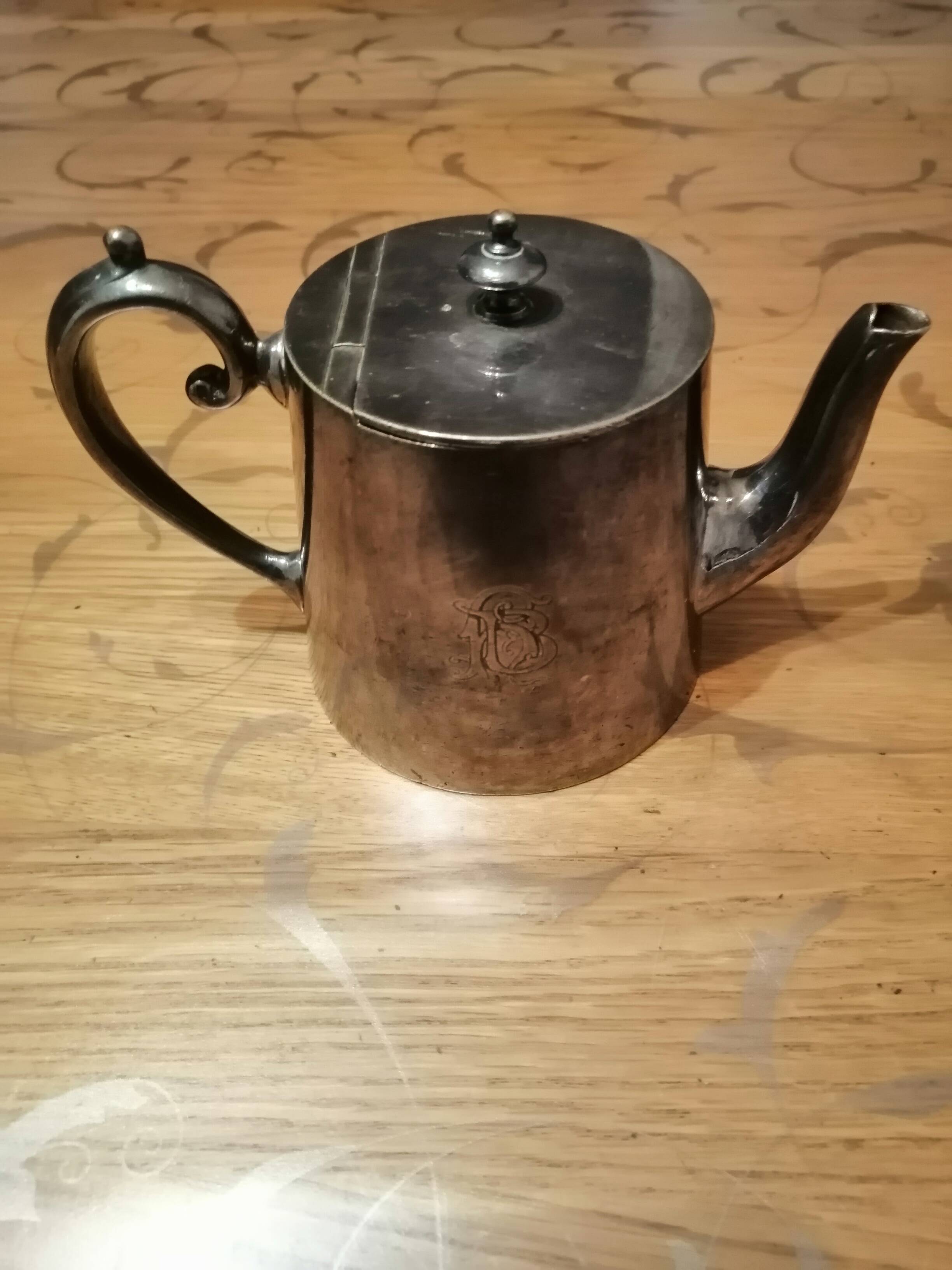 small silver-plated teapot