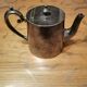 small silver-plated teapot