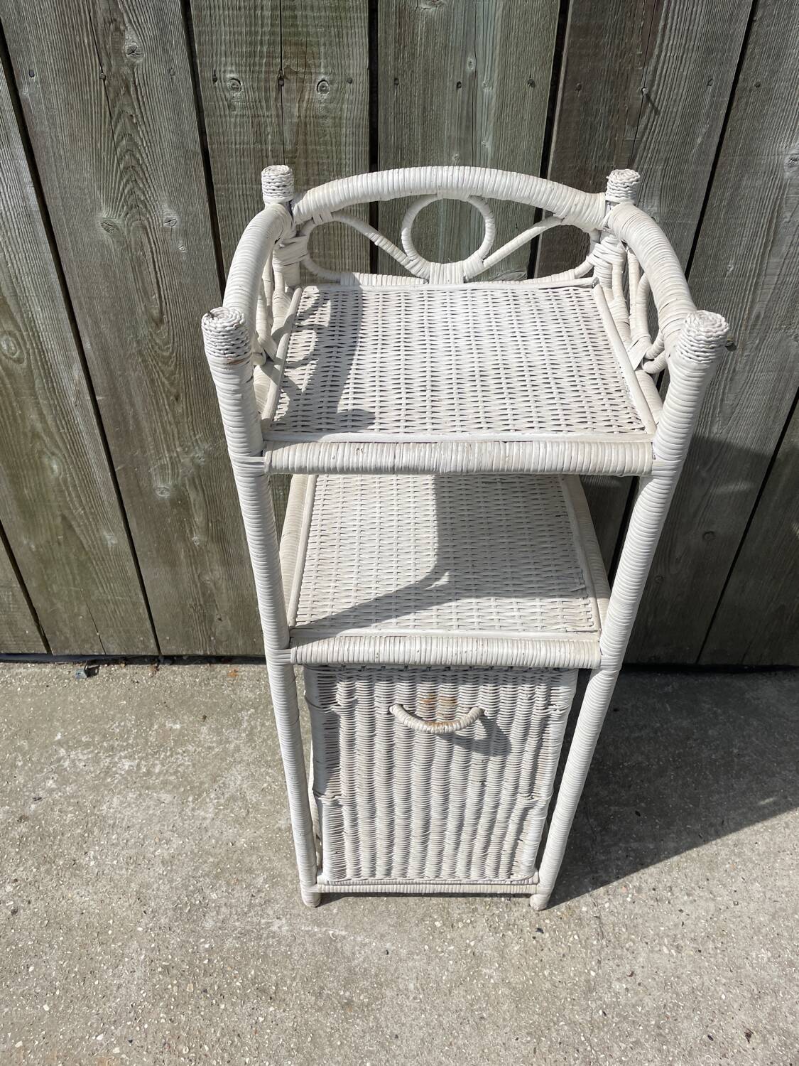 Small white wicker bathroom shelf