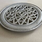 Old cast aluminum trivet