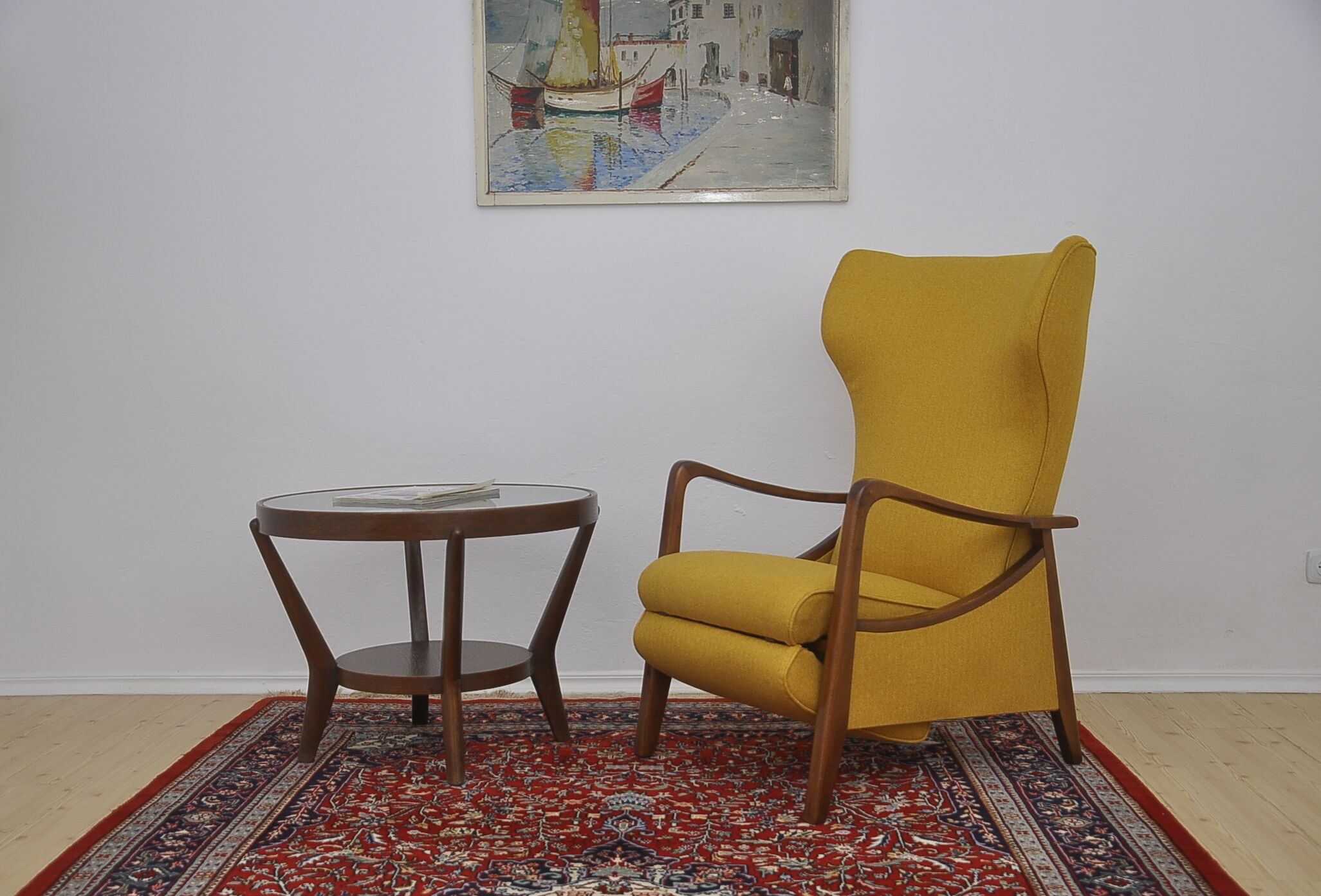 Mid-century Wingback armchair with folding footrest, 1960s
