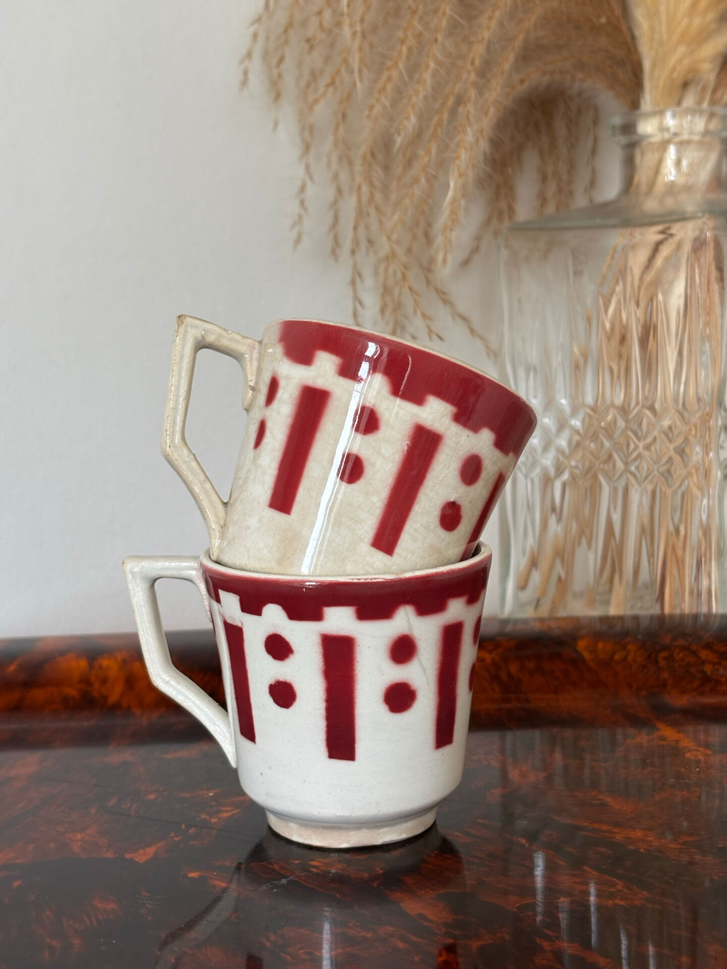 Set of two antique opaque porcelain cups from Gien.