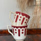 Set of two antique opaque porcelain cups from Gien.