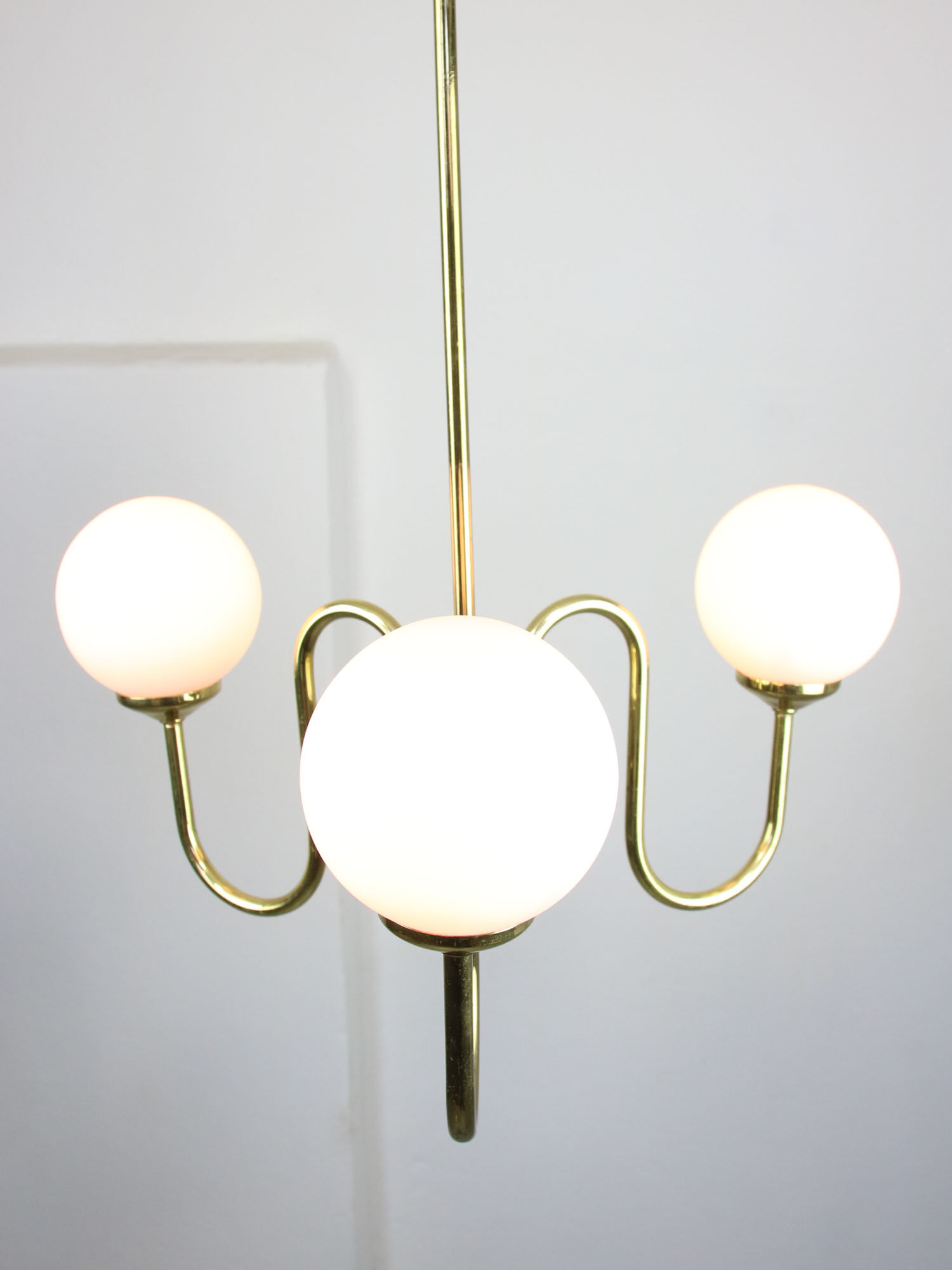 Vintage golden chandelier in opaline glass