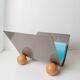 Vintage metal magazine rack with wooden ball feet - Space Age design from the 1980s - Decorative storage for magazines - Elegant retro gift idea