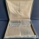 12 Christofle table forks and 12 spoons