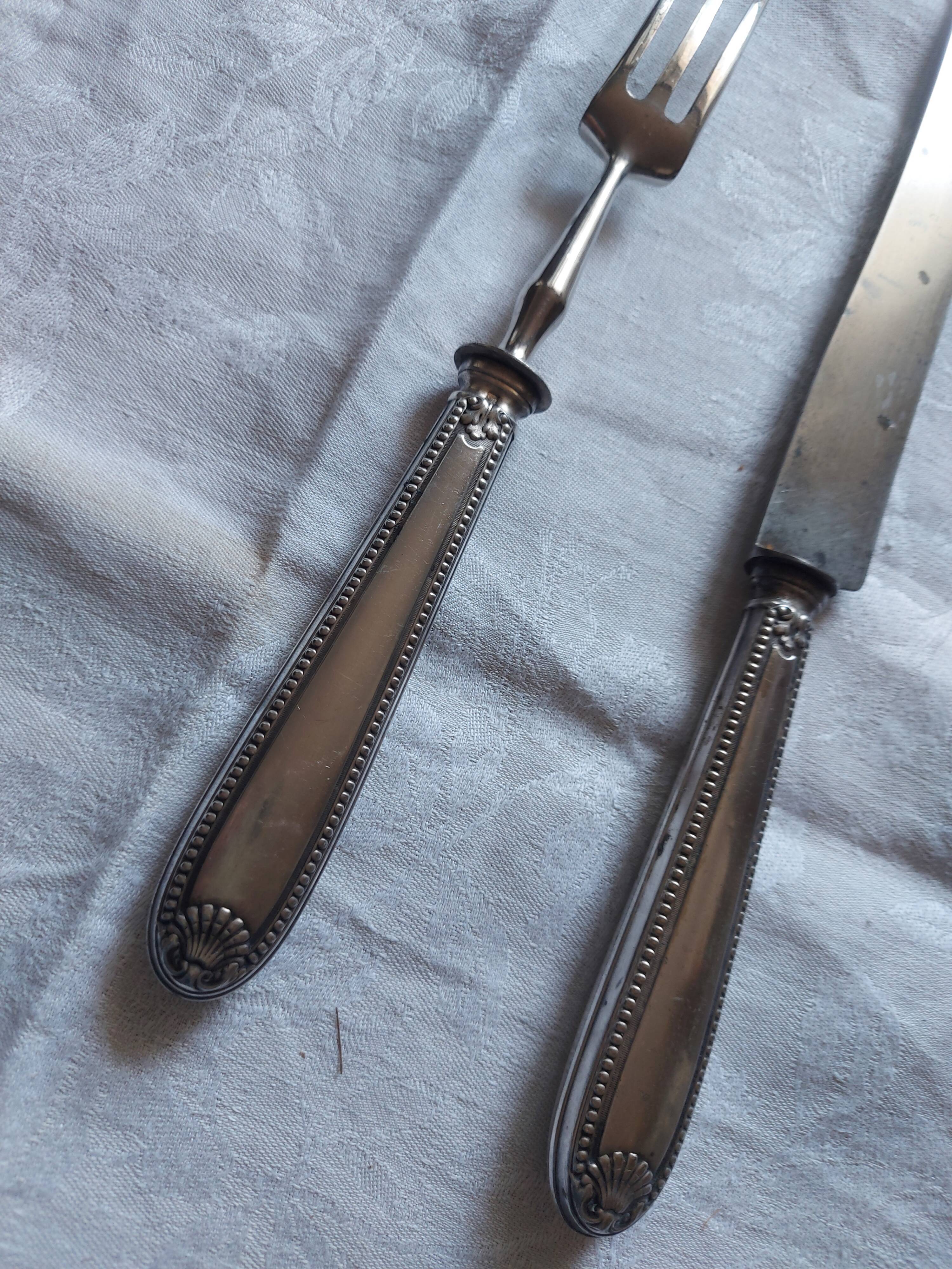 Serving, silvered metal leg cutlery