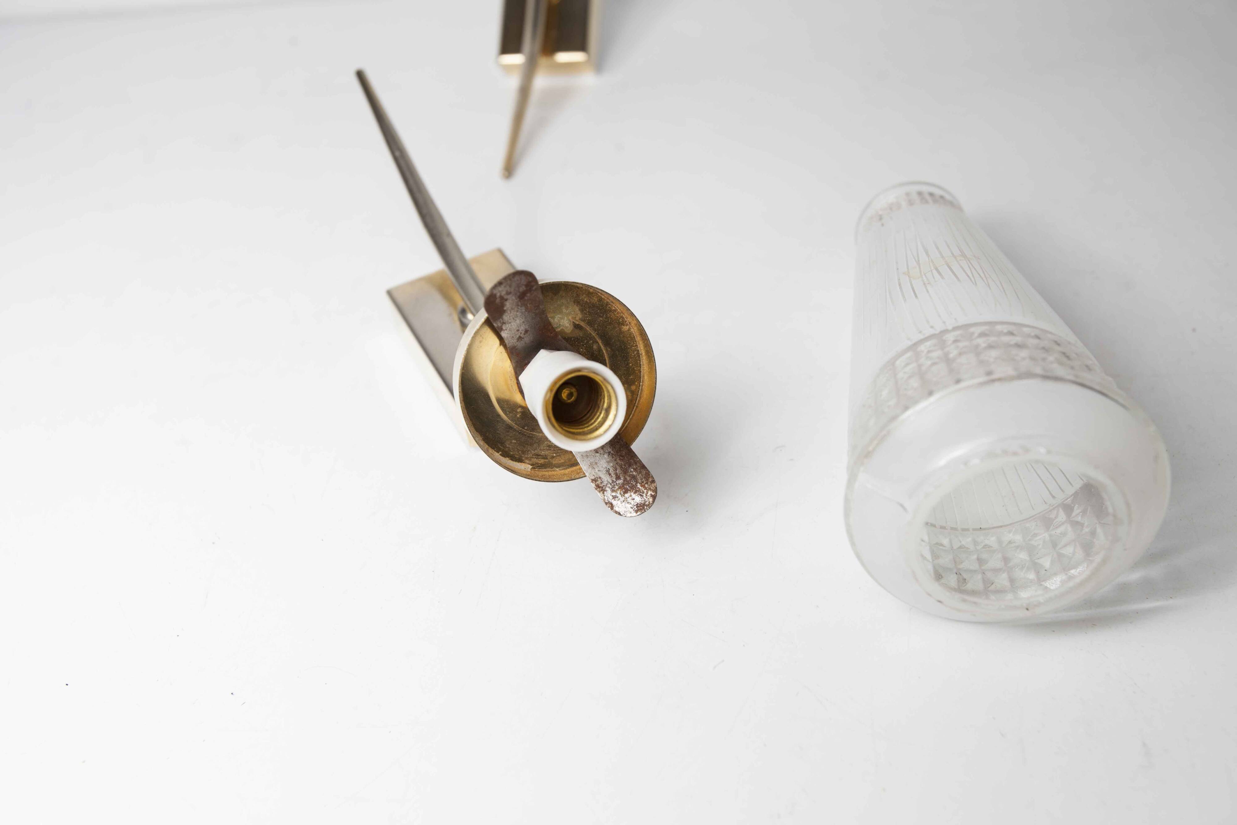 Pair of brass and white and transparent glass wall lights 1960