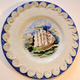 Ceramic dish signed Marc Roussel representing a sailboat, 20th century period