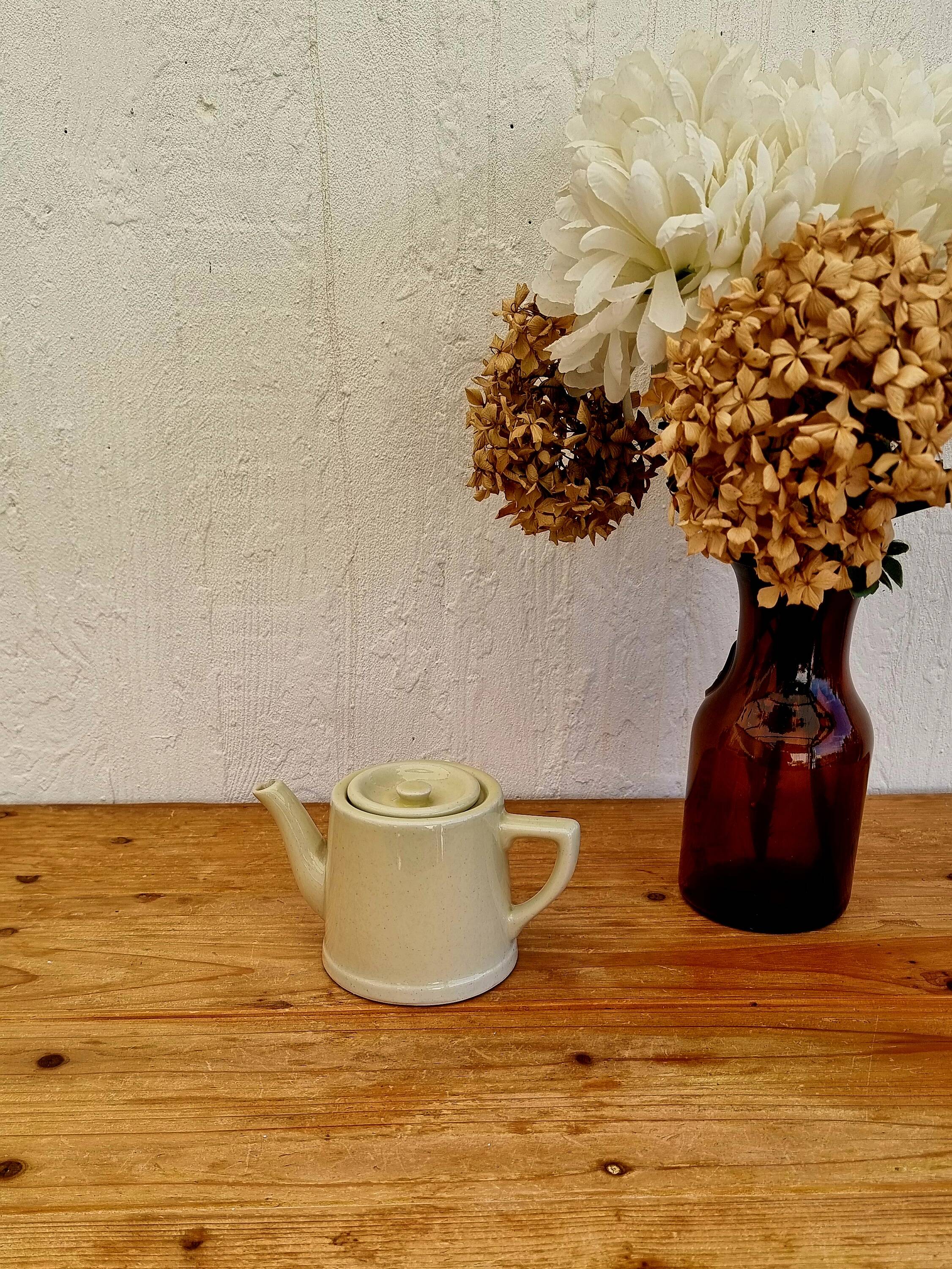 Vintage pastel yellow teapot
