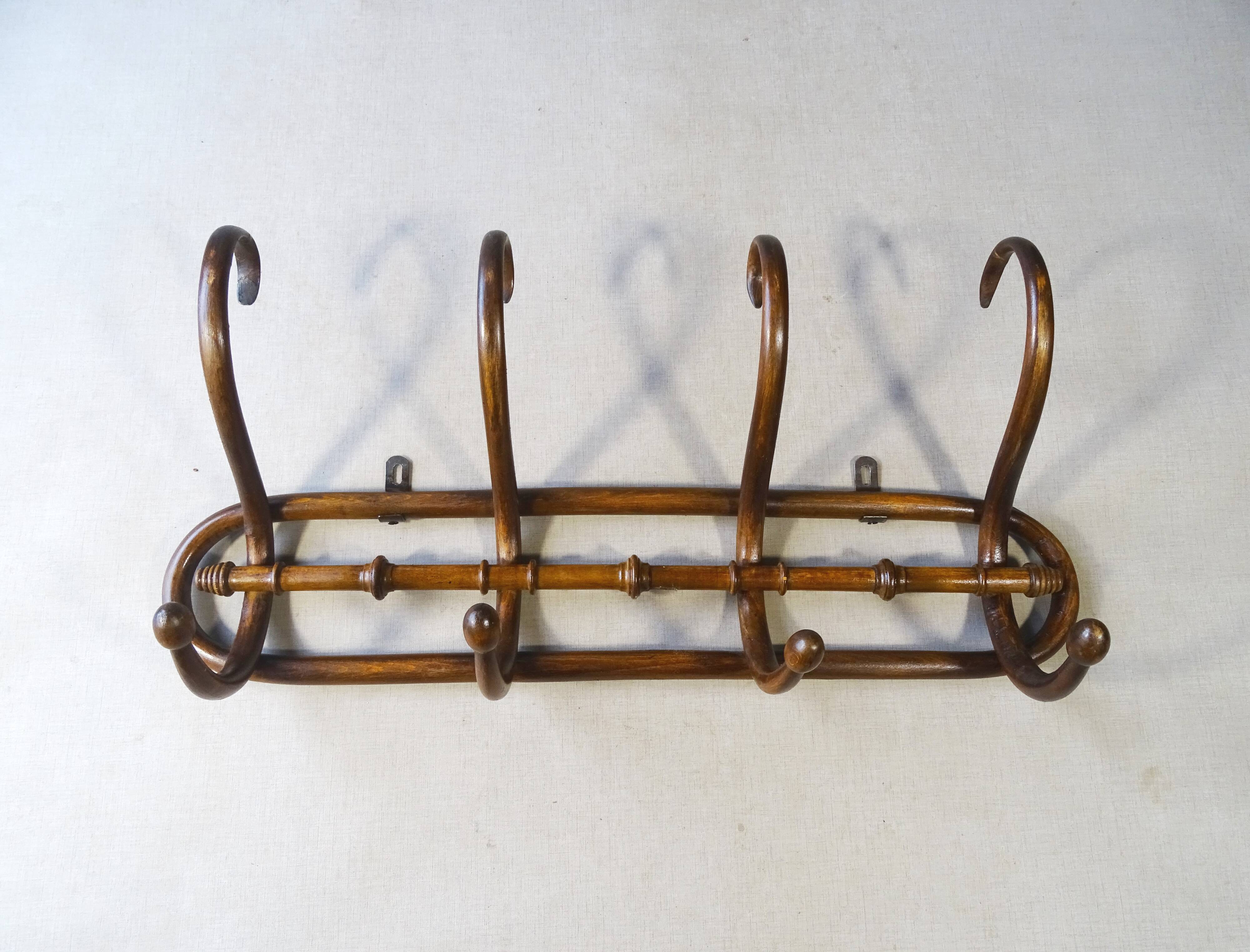 Wall coat rack by Kohn, bent wood 1910, no Thonet.