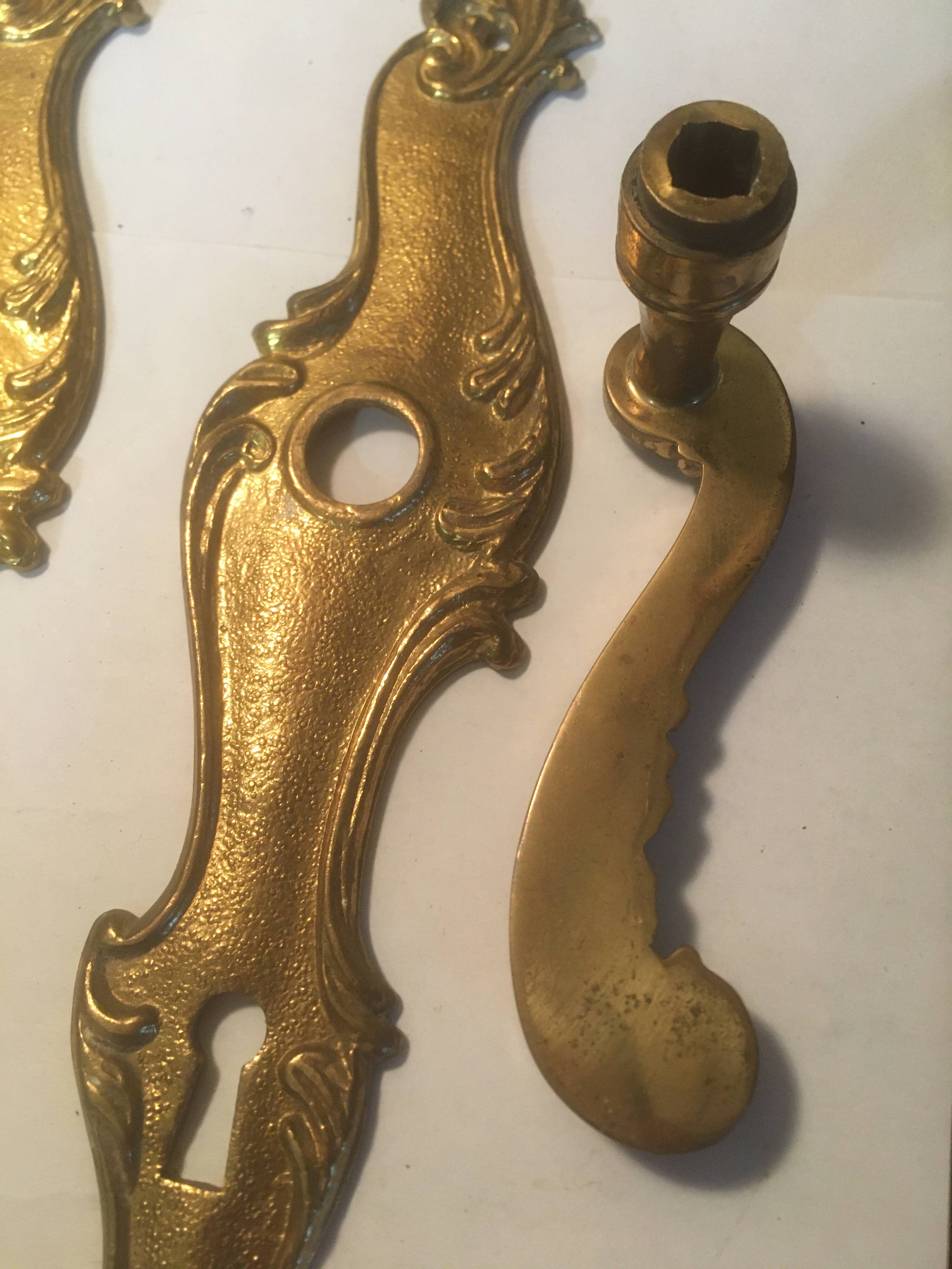 Louis xv style brass crutches and plaques