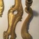 Louis xv style brass crutches and plaques