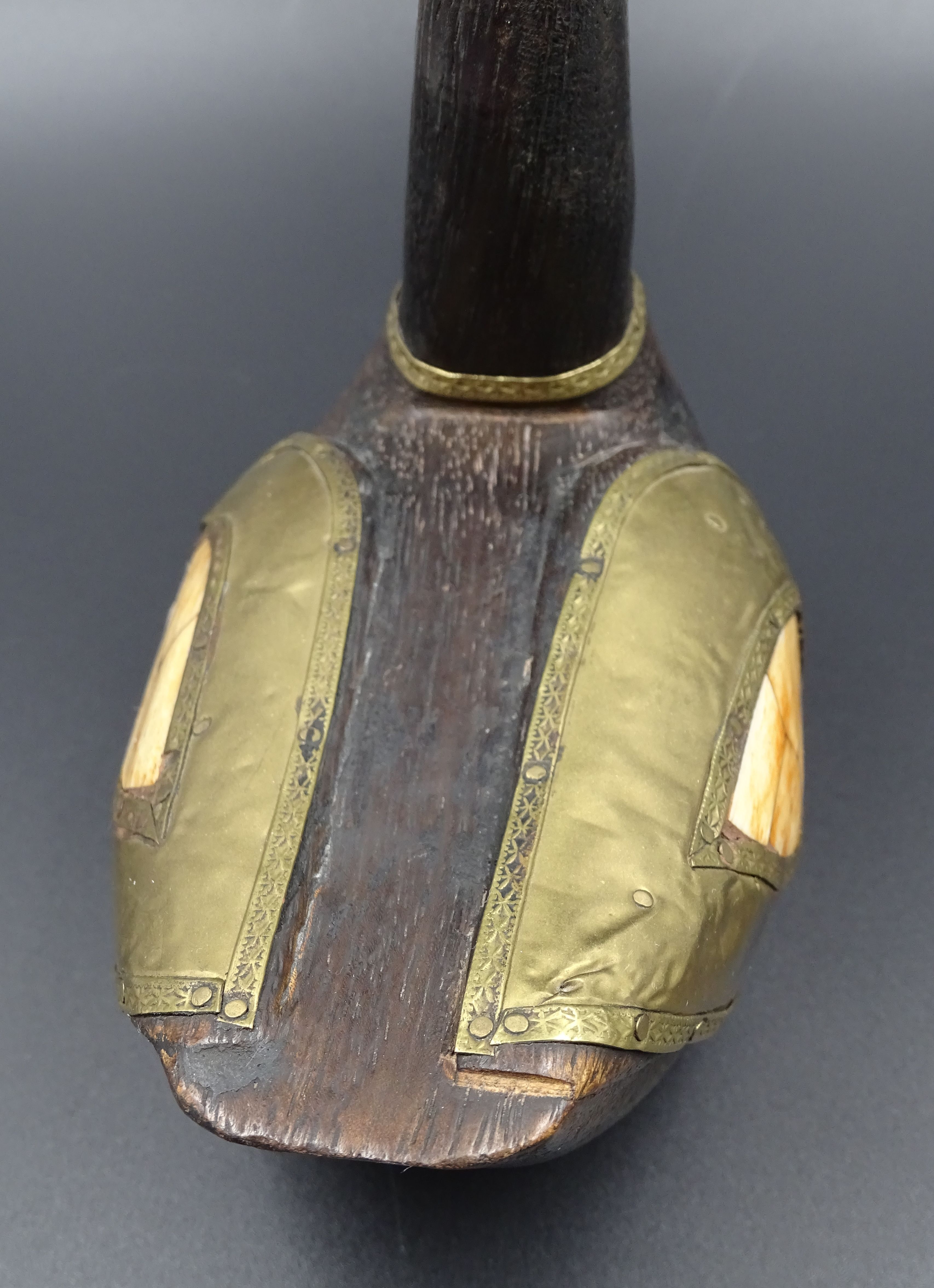 Wooden and brass swan