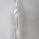 Vintage milk bottle in clear glass