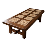 Vintage 60s coffee table with tile decoration of birds and flowers.