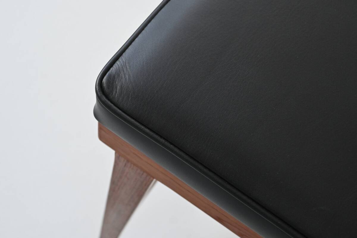 Erik Buck set of three bar stools in teak and leather Dyrlund Denmark 1960