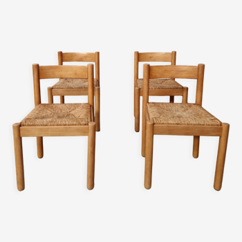 4 wooden and straw chairs