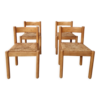 4 wooden and straw chairs