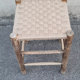 Vintage handmade wooden stool and rope