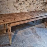Antique French pine dining table, large farmhouse table on wheels, 19th century.
