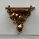 Set of three gilded wood consoles in Rococo style, late 19th century.