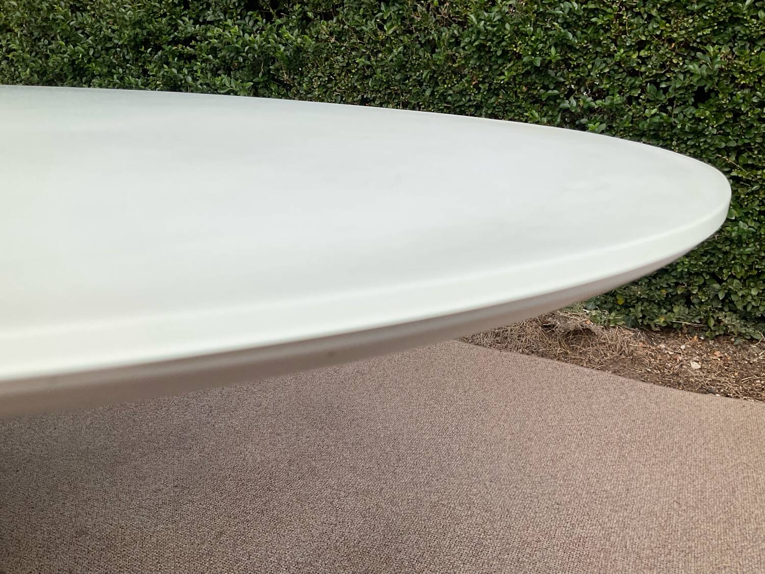 Oval designer dining table in frosted glass and brushed stainless steel