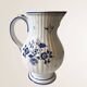 Moutiers earthenware jug, hand-painted blue decoration.