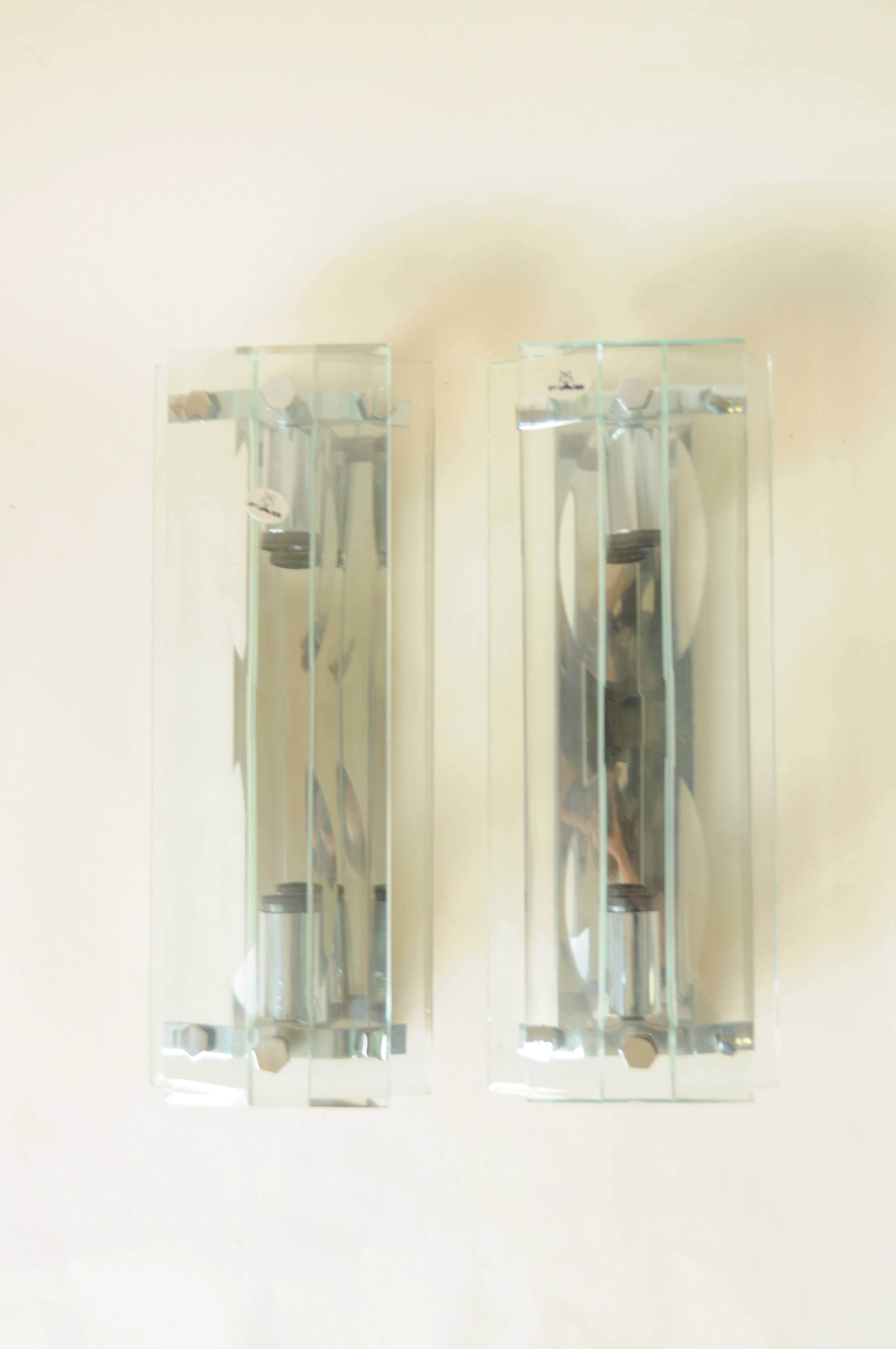 Pair of vintage glass and chrome wall sconces