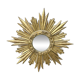 Large sun mirror in carved gilded wood.